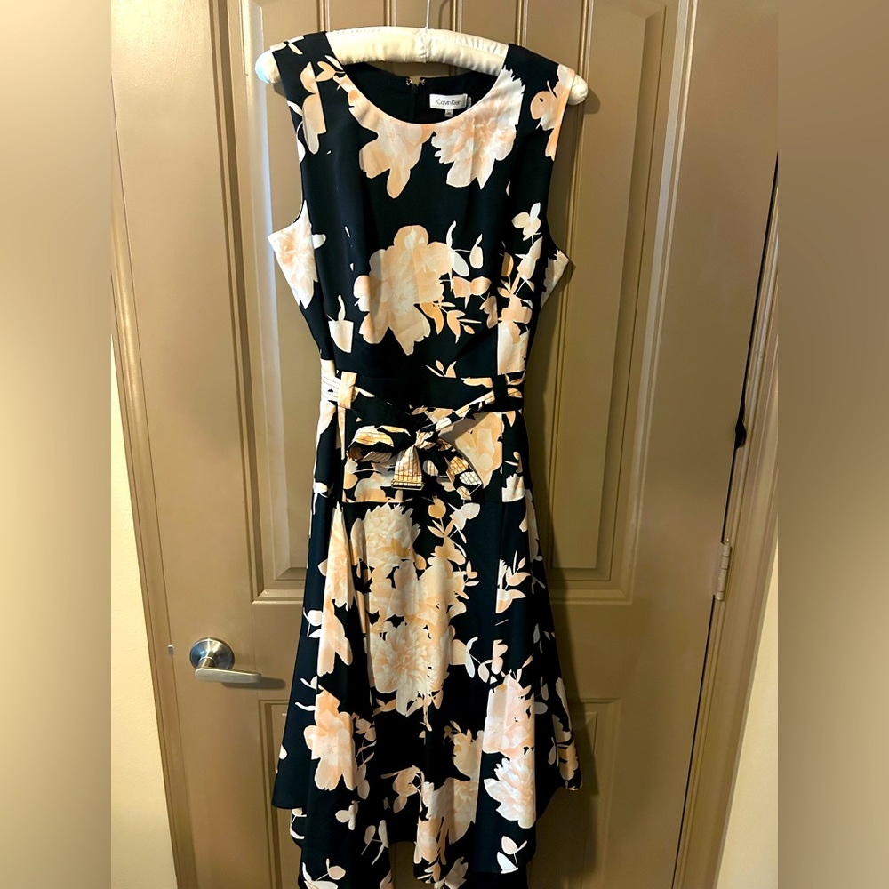 Brand new with tags beautiful floral Calvin Klein dress! Size 14.